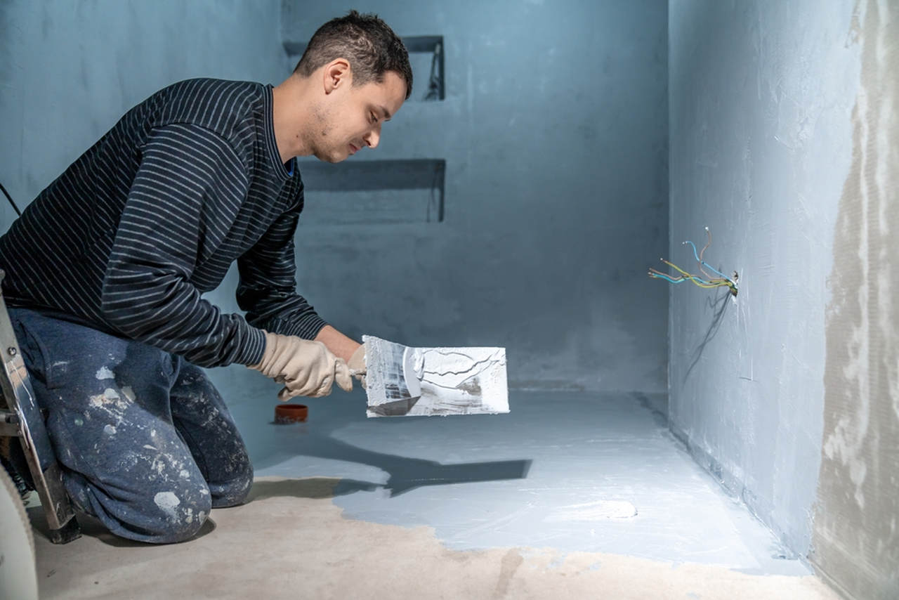 waterproofing appliance to the floor of bathroom