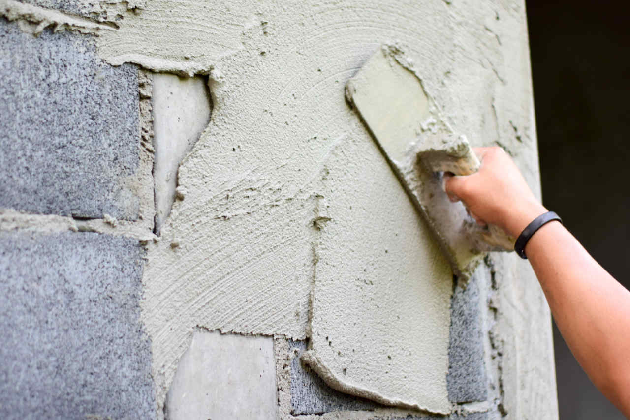 worker applying concrete